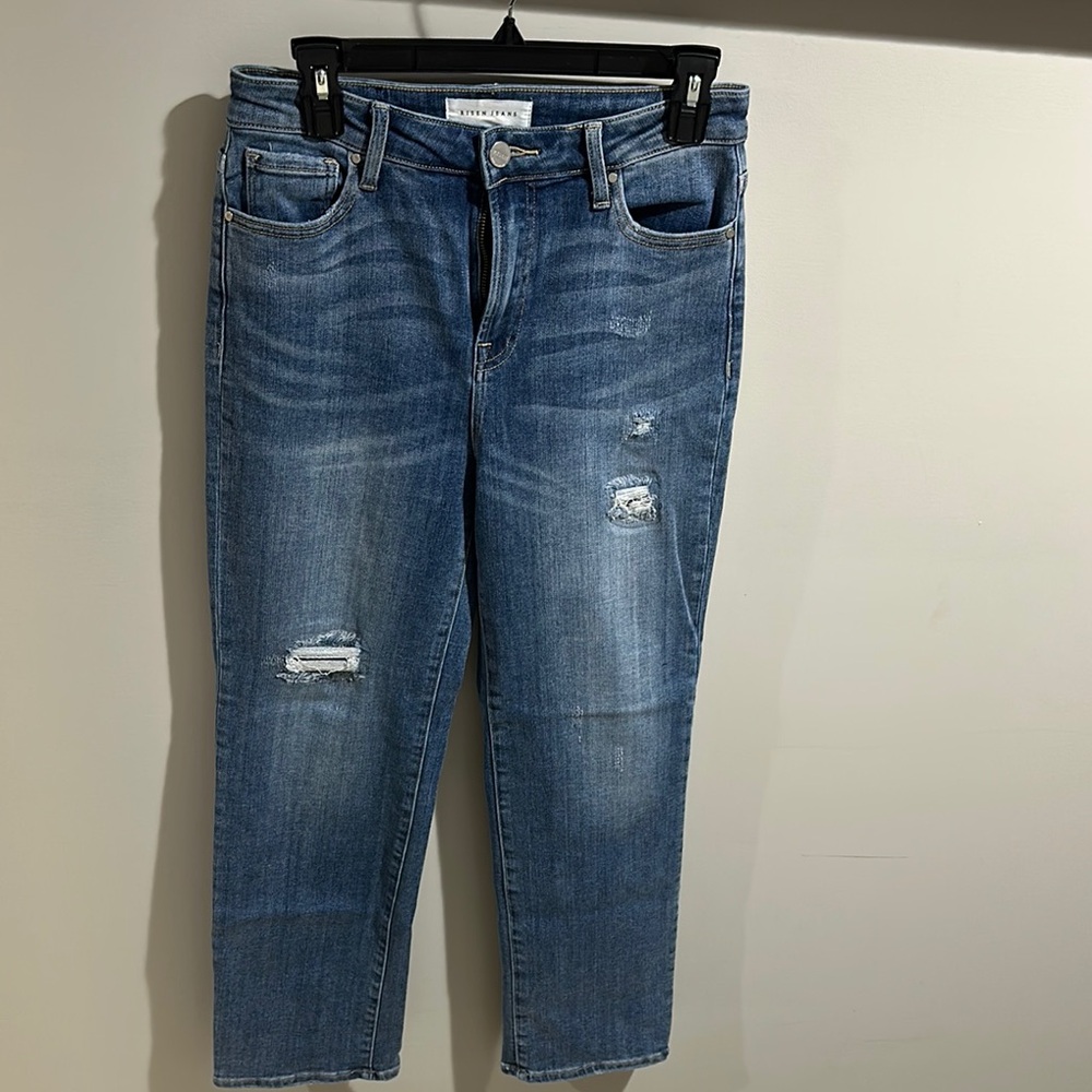 Blue Boot Cut Jeans with Distressed Details
